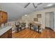 Second floor landing with bamboo flooring, bookcases, and view to downstairs at 2180 Clover Hill Rd, Palm Harbor, FL 34683