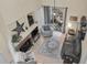 Bright living room with a fireplace, cozy seating, and a view to the patio at 2180 Clover Hill Rd, Palm Harbor, FL 34683