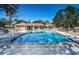 Relaxing community pool with lounge chairs at 2180 Clover Hill Rd, Palm Harbor, FL 34683