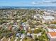 Aerial view capturing the home's setting within a neighborhood close to the waterfront and city amenities at 2530 Sunset Dr, Largo, FL 33770