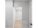 Hallway view of the bathroom featuring a tiled shower at 2530 Sunset Dr, Largo, FL 33770