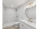 Stylish bathroom featuring a vanity and updated tile and fixtures at 2530 Sunset Dr, Largo, FL 33770
