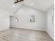 Bright bedroom with vaulted ceilings and a pair of windows at 2530 Sunset Dr, Largo, FL 33770