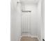 Narrow storage closet with shelving at 2530 Sunset Dr, Largo, FL 33770