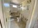 Bathroom shows a toilet, shower, and tub in need of repair at 2832 W Bay Haven Dr, Tampa, FL 33611