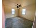 Bedroom with ceiling fan has two large windows providing natural light at 2832 W Bay Haven Dr, Tampa, FL 33611