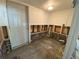 Entryway shows exterior door with the studs of the framework exposed at 2832 W Bay Haven Dr, Tampa, FL 33611