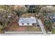 Cozy single story home with mature trees in a charming neighborhood with a large backyard and white picket fence at 2832 W Bay Haven Dr, Tampa, FL 33611