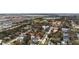 Aerial view of neighborhood with cozy single story home near baseball fields, Tampa Bay, and Tampa International Airport at 2832 W Bay Haven Dr, Tampa, FL 33611