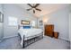 Bright bedroom featuring neutral colors, a ceiling fan, and natural light from windows offering tranquility at 3350 Brian N Rd, Palm Harbor, FL 34685