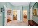 Hallway that is a connector space with doors leading to other areas of the home at 3350 Brian N Rd, Palm Harbor, FL 34685