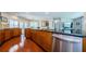 Stylish kitchen with sleek cabinetry, granite countertops, and stainless steel appliances for modern convenience at 3350 Brian N Rd, Palm Harbor, FL 34685