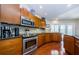 Well-equipped kitchen featuring modern appliances, ample cabinetry, and a functional layout for easy cooking at 3350 Brian N Rd, Palm Harbor, FL 34685