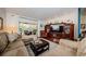 Inviting living room with hardwood floors and comfortable furnishings at 3350 Brian N Rd, Palm Harbor, FL 34685