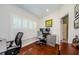 Bright office space with hardwood floors, plantation shutters, and ample room for work at 3350 Brian N Rd, Palm Harbor, FL 34685
