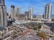 Bright aerial view of the city skyline, featuring modern architecture and a busy commercial area with ample parking at 400 4Th S Ave # 704, St Petersburg, FL 33701