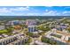 Expansive aerial view shows cityscape with modern buildings, lush greenery, and scenic horizon at 400 4Th S Ave # 704, St Petersburg, FL 33701