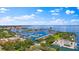 Breathtaking aerial view of the bay, showcasing the marina and waterfront community surrounded by lush greenery at 400 4Th S Ave # 704, St Petersburg, FL 33701