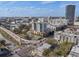 Scenic aerial view of a mixed-use building with modern design, surrounded by cityscapes and lush greenery at 400 4Th S Ave # 704, St Petersburg, FL 33701