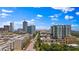 Scenic aerial view showcasing city buildings and a well-maintained road with lush trees at 400 4Th S Ave # 704, St Petersburg, FL 33701