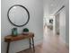 Inviting hallway with a stylish mirror, showcasing the open floor plan and bright, modern design elements at 400 4Th S Ave # 704, St Petersburg, FL 33701