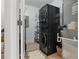 Efficient laundry room with a modern, stacked washer and dryer, maximizing space and convenience for residents at 400 4Th S Ave # 704, St Petersburg, FL 33701