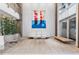 Bright lobby with modern art, comfortable seating, and high ceilings provides a welcoming space at 400 4Th S Ave # 704, St Petersburg, FL 33701