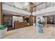 Elegant lobby with a reception desk, stylish furniture, and lush plants offers a grand entrance at 400 4Th S Ave # 704, St Petersburg, FL 33701