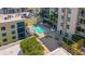 Rooftop pool and lounge area with comfortable seating, lush greenery, and stunning skyline views at 400 4Th S Ave # 704, St Petersburg, FL 33701