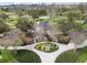 Aerial view of the dog park, featuring a fenced-in area with walking paths and landscaping at 4016 Cadence Loop, Land O Lakes, FL 34638