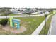 Bexley Elementary School with a large parking lot and well-maintained grounds in a suburban setting at 4016 Cadence Loop, Land O Lakes, FL 34638