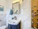 Elegant bathroom boasts a modern vanity, stylish mirror, and a luxurious multi-jet shower system at 4100 Narvarez S Way, St Petersburg, FL 33712