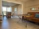 Inviting dining area featuring stylish table and chairs next to comfortable seating space, and neutral colored floors at 4100 Narvarez S Way, St Petersburg, FL 33712