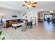 Cozy living room with a large sectional, neutral decor, wood floors, and an open layout at 4100 Narvarez S Way, St Petersburg, FL 33712