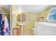 This bathroom features a pedestal sink, large soaking tub and closet space at 4804 N 10Th St, Tampa, FL 33603