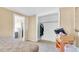 This bedroom has a closet, bed and a window at 4804 N 10Th St, Tampa, FL 33603