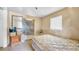 This bedroom has a window, fan and a closet at 4804 N 10Th St, Tampa, FL 33603
