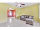 Open living room area featuring tile flooring, neutral tones, and natural light at 4804 N 10Th St, Tampa, FL 33603