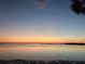 Amazing sunset view over calm waters with a clear horizon and serene ambiance at 4851 W Gandy Blvd # 14C, Tampa, FL 33611