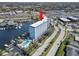 Aerial view of the waterfront condo featuring a marina and easy access to the city at 4939 Floramar Ter # 208, New Port Richey, FL 34652
