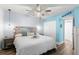 Comfortable bedroom featuring wood-look floors and a rustic driftwood headboard at 4939 Floramar Ter # 208, New Port Richey, FL 34652