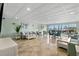 Bright lobby area featuring tile flooring, stylish seating, and water views at 4939 Floramar Ter # 208, New Port Richey, FL 34652