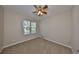 Bedroom featuring plush carpet, neutral paint and a window allowing for ample natural light at 5124 Clover Mist Dr, Apollo Beach, FL 33572