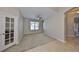 Spacious bedroom featuring neutral paint, carpet, and a ceiling fan at 5124 Clover Mist Dr, Apollo Beach, FL 33572