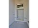Close-up of the front door showcasing its design and secure entry features at 5124 Clover Mist Dr, Apollo Beach, FL 33572
