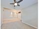 Bright living room featuring arched doorways, high ceilings, recessed lighting, and neutral paint at 5124 Clover Mist Dr, Apollo Beach, FL 33572