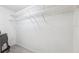 Walk-in closet with wire shelving and plank flooring at 6141 Chesham Dr # 7, New Port Richey, FL 34653