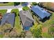 Aerial view of the property and neighboring homes within the community at 10105 Holly Berry Dr, Weeki Wachee, FL 34613
