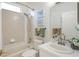 Bright bathroom with a shower/tub combination and nautical themed decor at 10105 Holly Berry Dr, Weeki Wachee, FL 34613
