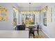 Cozy breakfast nook with large windows offering natural light and views at 10105 Holly Berry Dr, Weeki Wachee, FL 34613